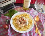 A picture of step 3 of Turkey strips with mushroom and spinach in creamy sauce on a bed of homemade Tagliatelle.