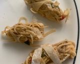 A picture of step 3 of Left over chowmien wrapped with torn Manda patti strips.