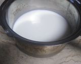 A picture of step 1 of Orange coloured Egg Pudding.