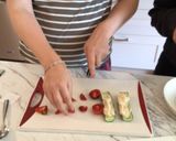 A picture of step 4 of Cucumber hummus boat.
