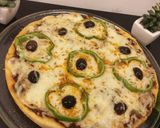 صورة لخطوة 12 من وصفة بيتزا 🍕 ولااااااطيب