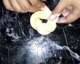 A picture of step 12 of Flower Donuts.