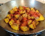 A picture of step 6 of Jeera Aloo (no boiled).