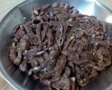 A picture of step 7 of Dry beef chilli.