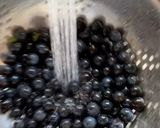A picture of step 2 of Sloe-boshi (a sacreligious seasonal version of umeboshi).