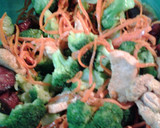 A picture of step 9 of Buttery broccoli salad topped with deviled eggs.