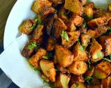 صورة لخطوة 3 من وصفة بطاطا حاره بالثوم والاعشاب 😋