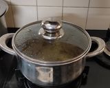 A picture of step 3 of Ginger Turmeric tea. (kadha).