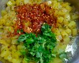 A picture of step 2 of Onion Potato Subzi.