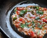 A picture of step 3 of Egg tomato onion omlette.