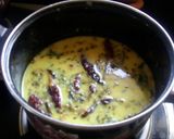 A picture of step 4 of Gujarati kadhi with Drumsticks.