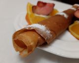 Une image de l'étape 5 de Crêpes aux sucre accompagnée de fruits frais 🍴.