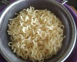 A picture of step 1 of "Schezwan Maggi with Baked Bread Bowl".