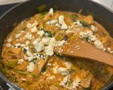 A picture of step 4 of One-pan lemony chicken spinach orzo.