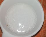 A picture of step 3 of Red Velvet çhoçolate inside Cupcakes with cream cheese frosting.
