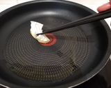 Une image de l'étape 5 de Tamagoyaki (omelette japonaise sucrée).