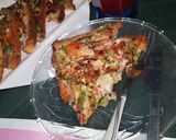 A picture of step 9 of Tawa bread pizza.