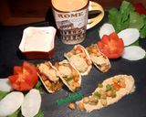 A picture of step 9 of Bread hummus tacos.