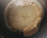 A picture of step 3 of Mutter Alo pulao.