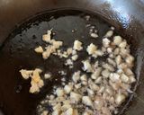 A picture of step 1 of Garlic oil - kra teum Jeaw 🧄.