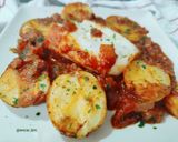 Foto del paso 8 de la receta: Bacalao al horno con tomate y patatas