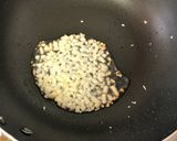 A picture of step 2 of Filipino Chicken Adobo Fried Rice.