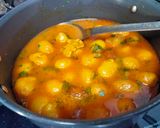 A picture of step 4 of Moong dal and posto savoury laddu curry.