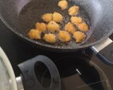 A picture of step 3 of Moong daal Mangochian (fried lentils balls in curry).