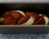 A picture of step 13 of Mini and Cute Cocoa Marble Bread | used two loaf pans.
