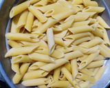 A picture of step 1 of Italian white sauce pasta.