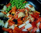 A picture of step 2 of Gajar Mooli Matar Sabzi.