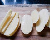 A picture of step 1 of Baked Potato Wedges.