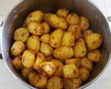 A picture of step 6 of Spicy roast potatoes.