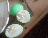 A picture of step 2 of Sweet n spicy devilled eggs.