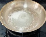 A picture of step 3 of Ghee Mysore Pak.