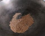 A picture of step 1 of Roasted gram dal and peanut chutney (jain recipe).