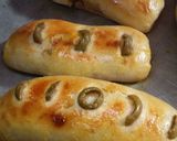 A picture of step 6 of Achari pizza roll.