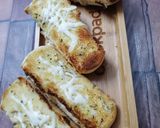 A picture of step 4 of Cheese Garlic bread.