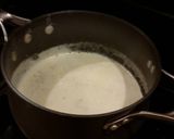 A picture of step 6 of Angel Hair Alfredo "Cakes" with Marinara Sauce and Sausage.