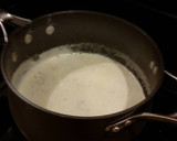 A picture of step 6 of Angel Hair Alfredo "Cakes" with Marinara Sauce and Sausage.