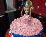 A picture of step 7 of Doll cake.