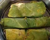 A picture of step 4 of Homemade crispy Patra with some spicy green chutney.