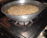 A picture of step 5 of Nachos with corn salsa.