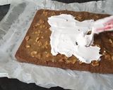 A picture of step 13 of Snickers Chocolate Roll Cake.