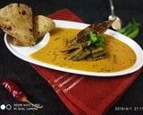 A picture of step 4 of Doi posto bhindi.