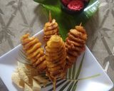 A picture of step 7 of Potatoes Tornadoes.