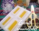 A picture of step 1 of Tang Orange Flavoured Popsicles.