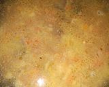 A picture of step 2 of Indomie with potato and dried fish.