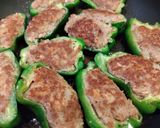 A picture of step 5 of Stuffed Bell Peppers in Sweet and Savory Sauce.