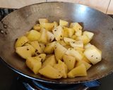 A picture of step 3 of Jeera Aloo (no boiled).